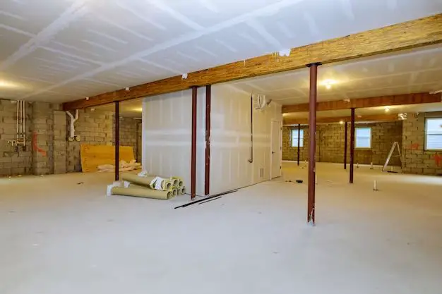 How to decorate unfinished basement walls?